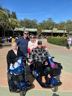 Shelly, brother, mom and dad Disney 2025 small Shelly, her brother, mom and dad at Disney 2025